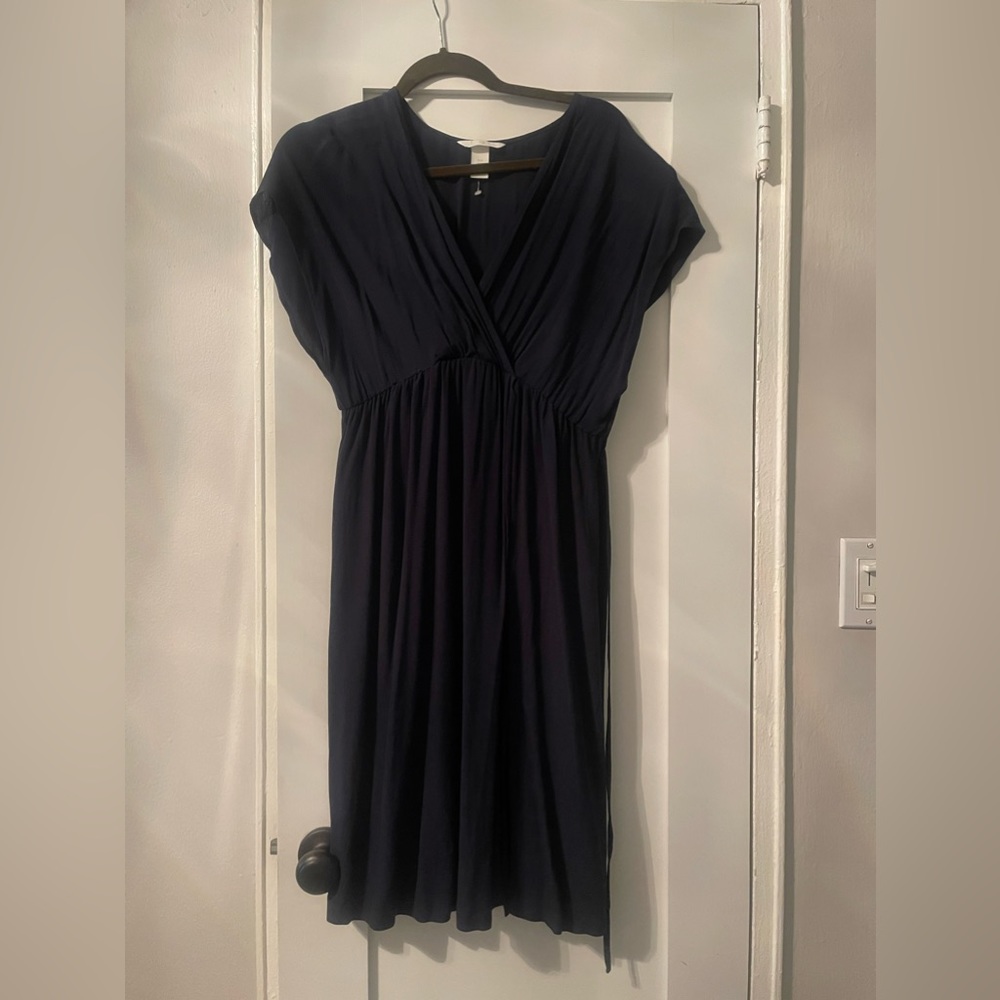 Beautiful, simple and light weight, dark purple dress.
